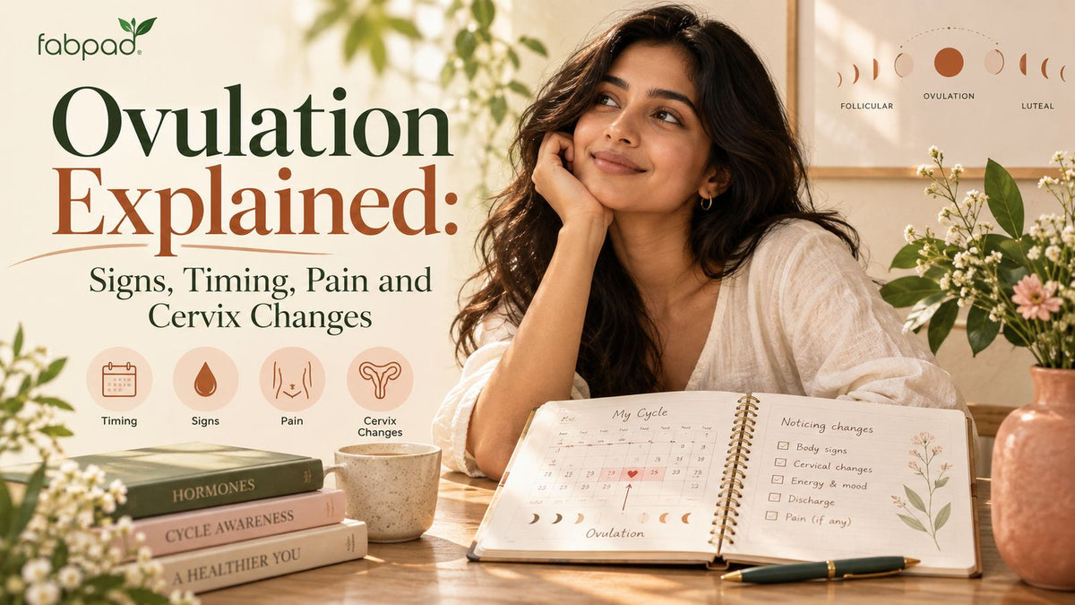 Ovulation explained: signs, timing, pain and cervix changes, woman with a cycle tracking journal marking ovulation