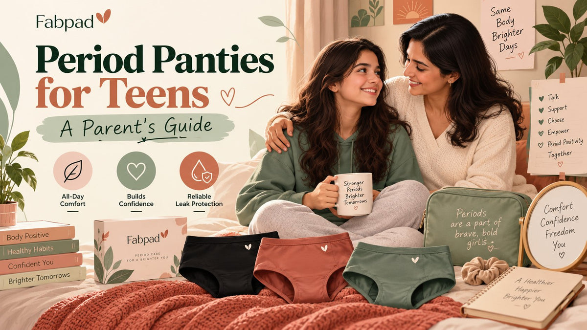 Mother hugging her teenage daughter on a bed, with black, rust and green teen period panties and a Fabpad box in front of them