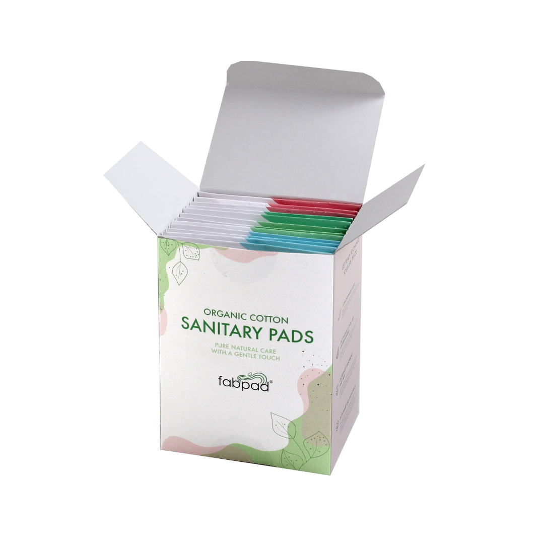 Box of organic cotton sanitary pads with visible brand name on a white background