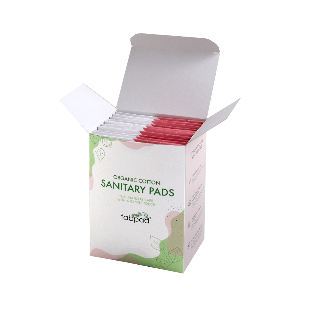 Box of organic cotton sanitary pads with visible branding on a white background
