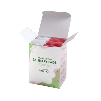 Box of organic cotton sanitary pads with visible branding on a white background